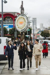 Local vendors and small businesses that support tourism on a busy American city street.