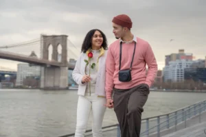 A vibrant collage showcasing what non-Americans love about the United States, including iconic landmarks like the Statue of Liberty, diverse food, Hollywood culture, and scenic national parks.